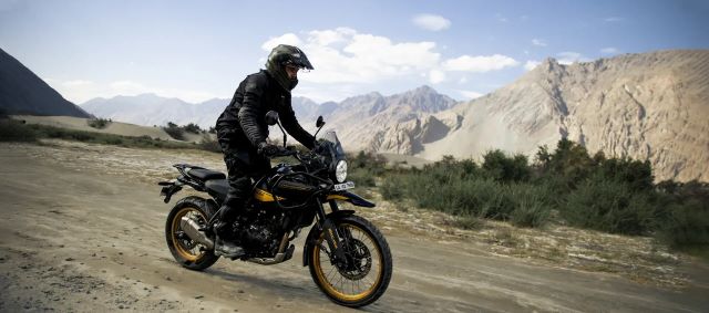 Royal Enfield, all-new Himalayan, Motoverse event, pricing, Base variant, ₹2.69 lakh, Kaza Brown, Pass variant, ₹2.74 lakh, Slate Himalayan Salt, Slate Himalayan Blue, Peak variant, ₹2.79 lakh, Kamet White, ₹2.84 lakh, Hanle Black, no mechanical differences, Sherpa 450 engine, Ride-by-Wire system, multiple riding modes, six-speed gearbox, slipper clutch, 150 kmph speed, enhanced suspension, aluminum wheels, 3 kg lighter, competitive pricing, Himalayan 450, successor, 2016 model, new features.