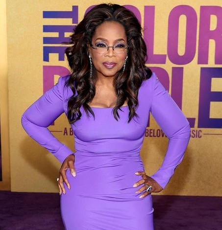 Oprah Winfrey, weight loss, The Colour Purple premiere, red carpet, transformation, health journey, struggles, triumphs, inspiring moment, fitness, lifestyle, TV icon, wellness, Ozempic, knee surgery, New York City panel, personal growth, radiant appearance, commitment, inspiring story.