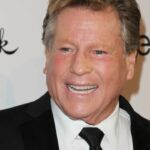 Ryan O'Neal, Hollywood icon, Love Story, Paper Moon, actor, cinematic legend, Hollywood career, iconic films, celebrity death, Hollywood mourns, film legacy, timeless star, Patrick O'Neal, Farrah Fawcett, actor's life, cinema tribute, Hollywood history, cinematic brilliance, iconic performances, movie star.