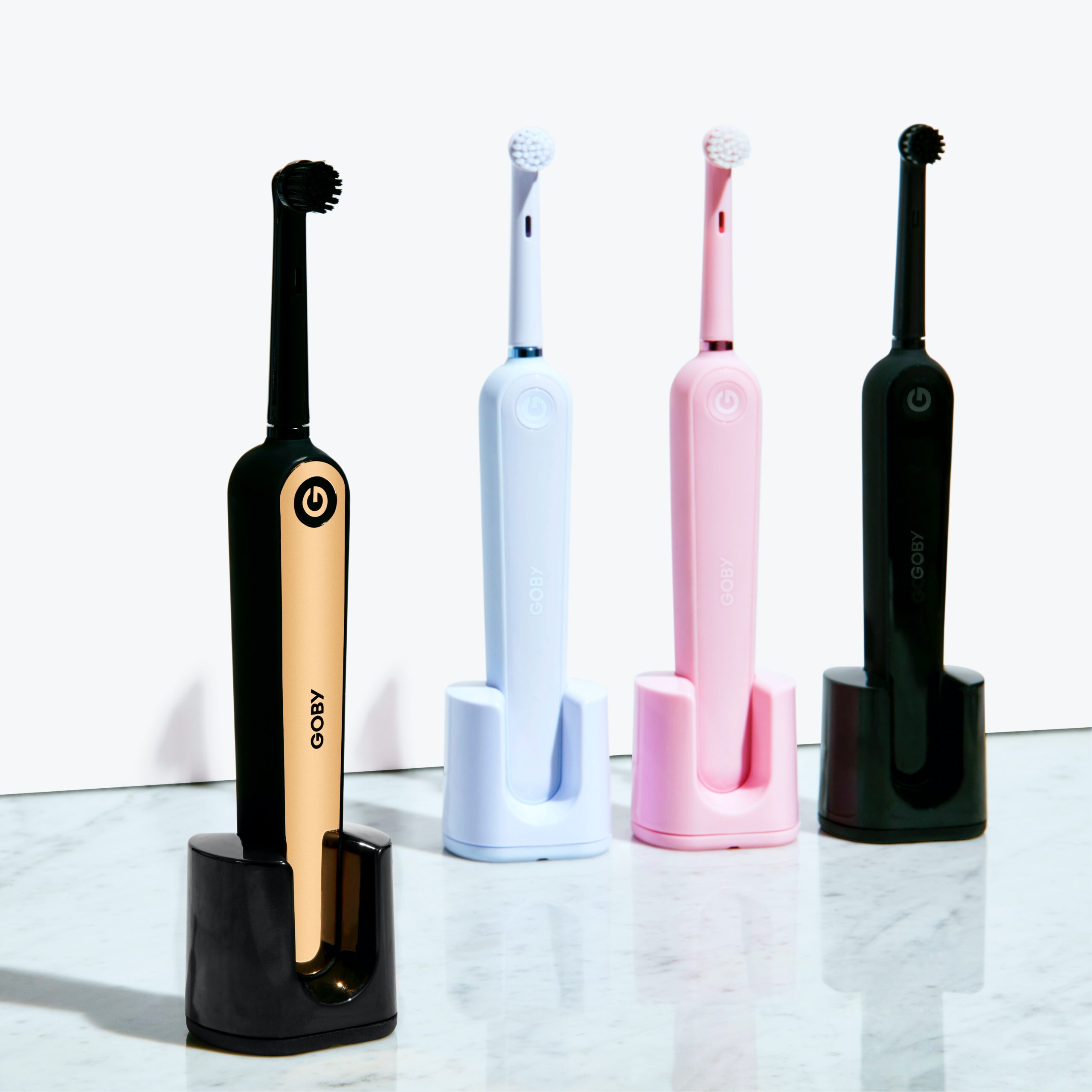 four electric toothbrushes