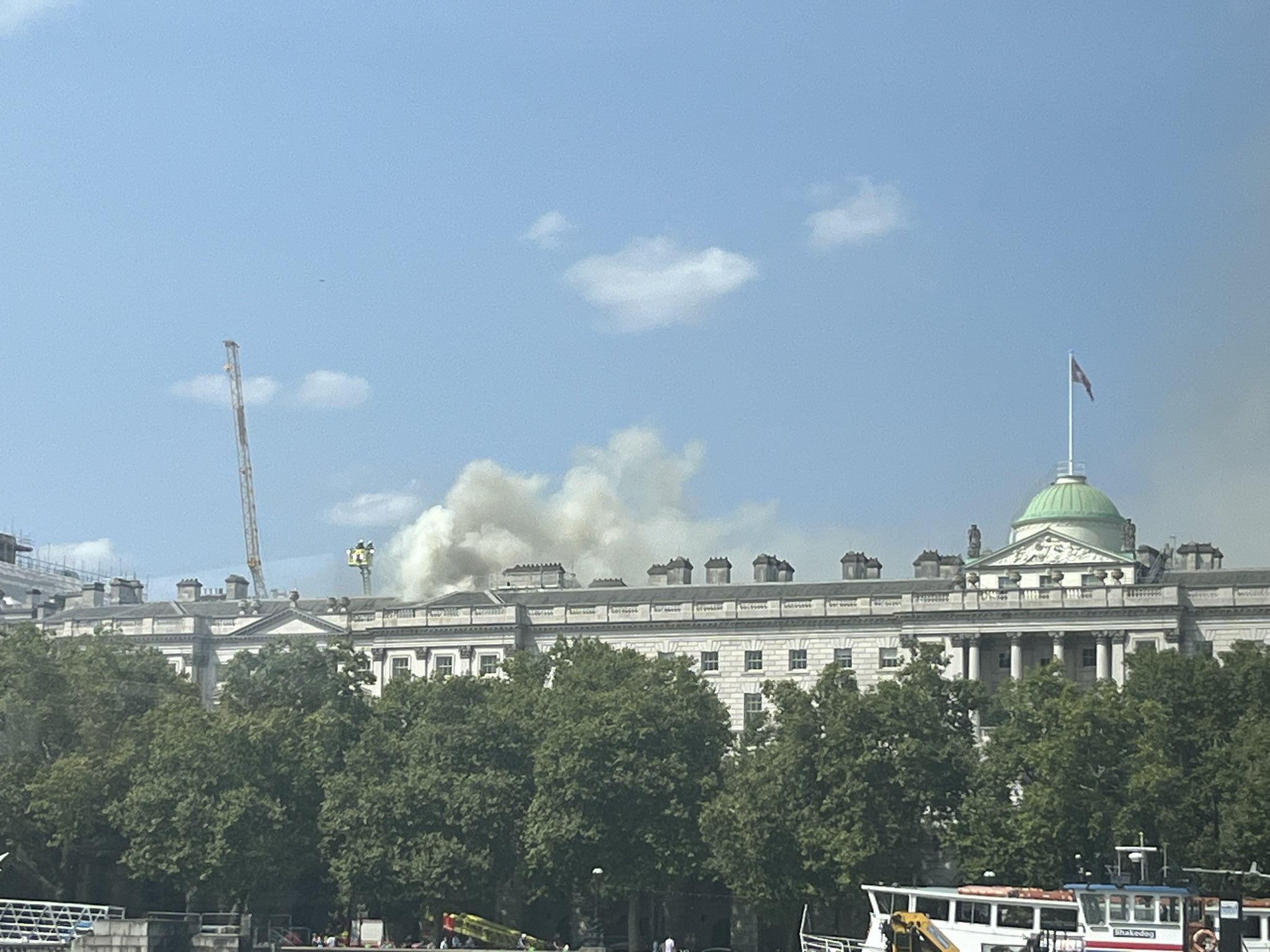 Somerset House, London, fire, historic building, emergency response, firefighters, cultural center, art gallery, evacuation, roof fire, London Fire Brigade, heritage site, Van Gogh, Cortauld Gallery, Kings College London, film location, architectural landmark, Edward Seymour, Treaty of London, cultural events, public safety, urban disaster, historical preservation